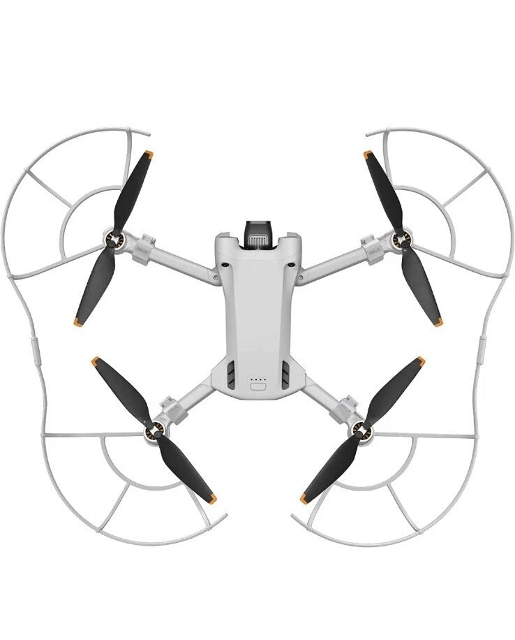 DJI MINI3 PRO drone propeller guards with four white rings and mounted black blades