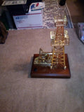 OIL PUMPING MECHANISM, A BRASS WORKING MODEL, USES ONE AA BATTERY TO RUN Battery