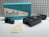 Electric stereo viewer with two lenses and battery adapter, black device with manual