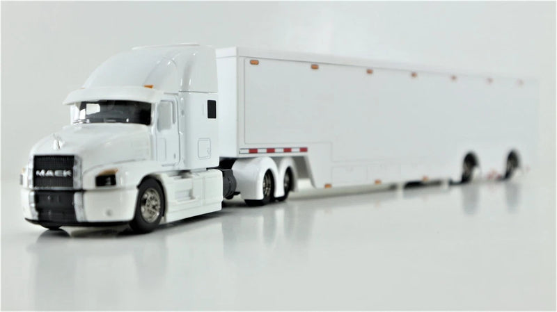 White enclosed transporter die-cast 1:64 model truck with Mack-style grille front