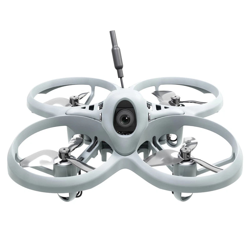 Small gray FPV quadcopter drone with four propellers, front camera and antenna mast