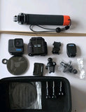 GoPro HERO11 Black mini action camera bundle with mounts, case, and spare accessories