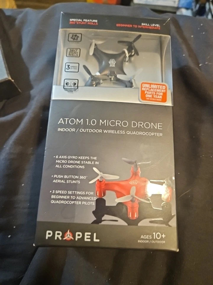 Propel Atom 1.0 micro quadcopter drone box with black drone illustration