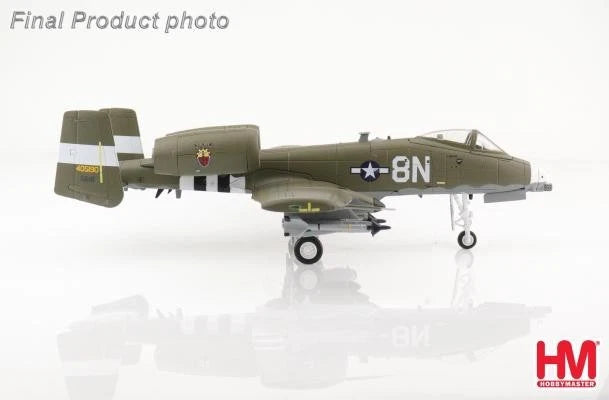 1:72 scale model fighter jet with olive green fuselage and “8N” marking