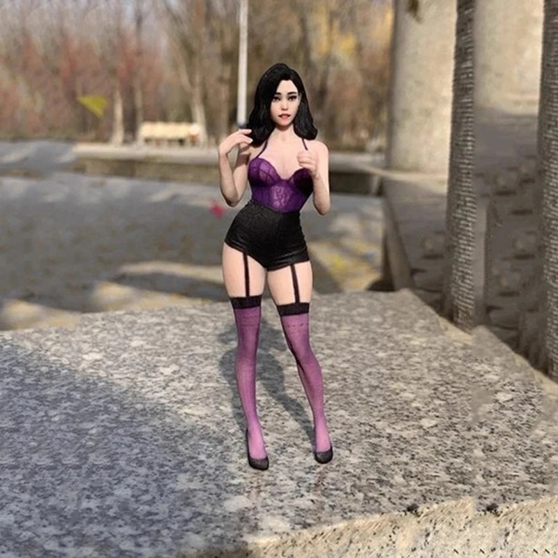 Miniature resin female figure in purple corset, black skirt, thigh-high stockings, heels