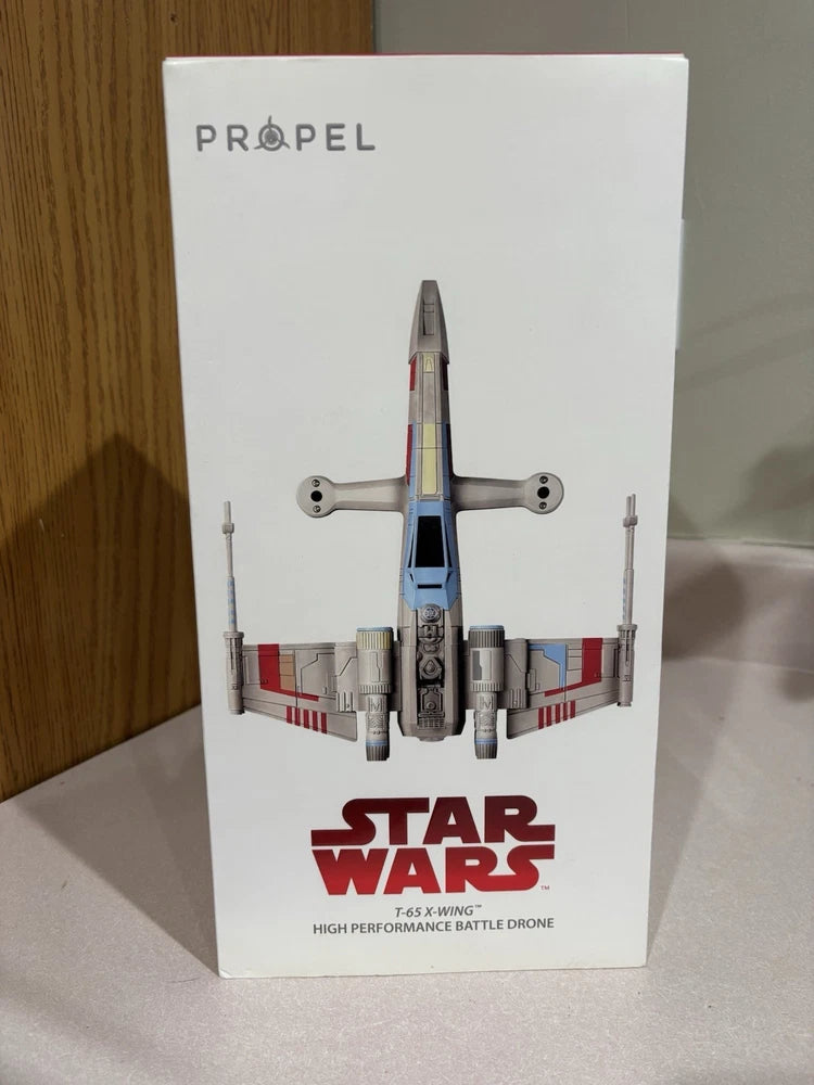 Multicolor T-65 X-Wing remote airplane drone in retail box with Star Wars graphics