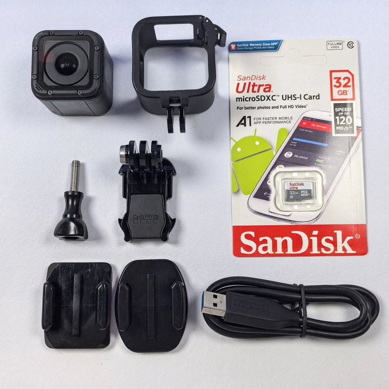 Waterproof action camera with case, mounts, microSD card, and USB cable accessories