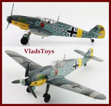 Die-cast style model fighter plane with Luftwaffe markings, gray and yellow, twin views