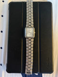 Gucci women's rectangular wristwatch with silver-tone linked bracelet and cream dial