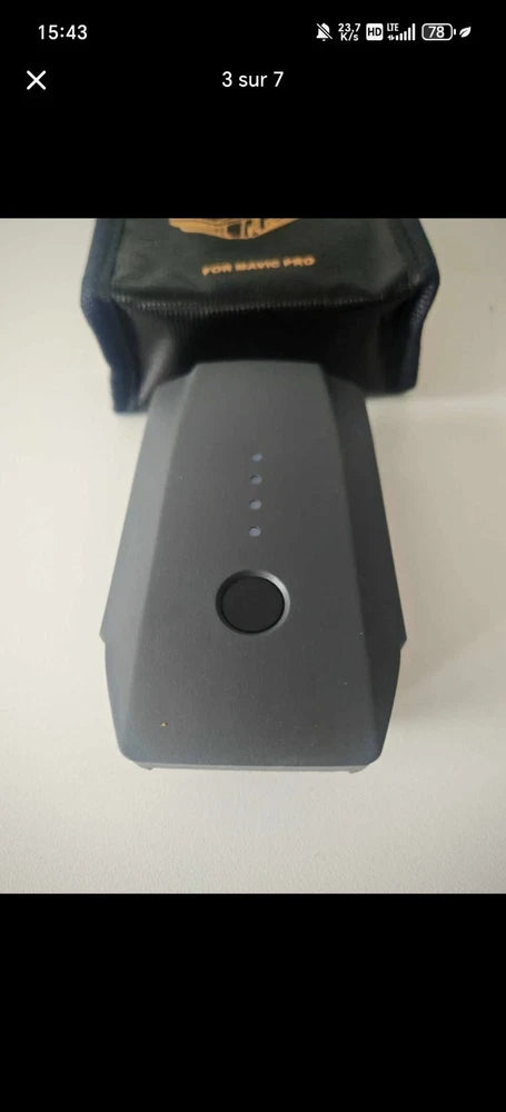 Gray intelligent flight battery with round status button