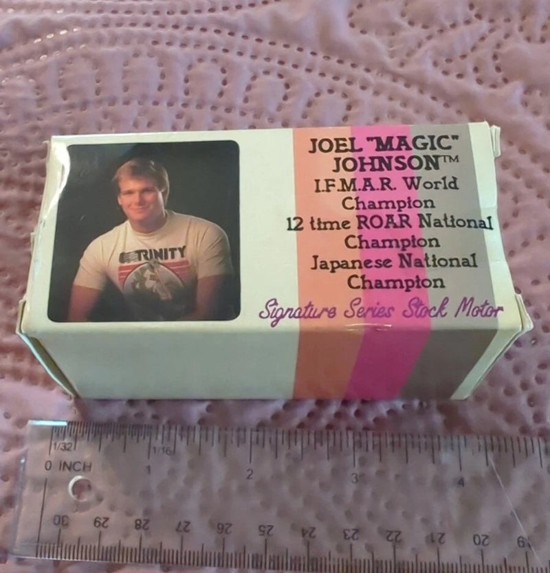 Vintage toy racing motor in box, with signature series stock motor label