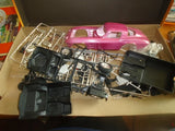 Pink battery-powered toy Sting Ray model with chrome frame and black battery box parts