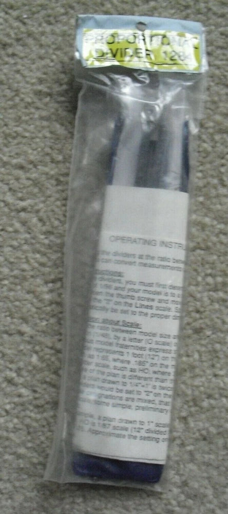 Proportional divider set in clear plastic bag with printed instructions sheet