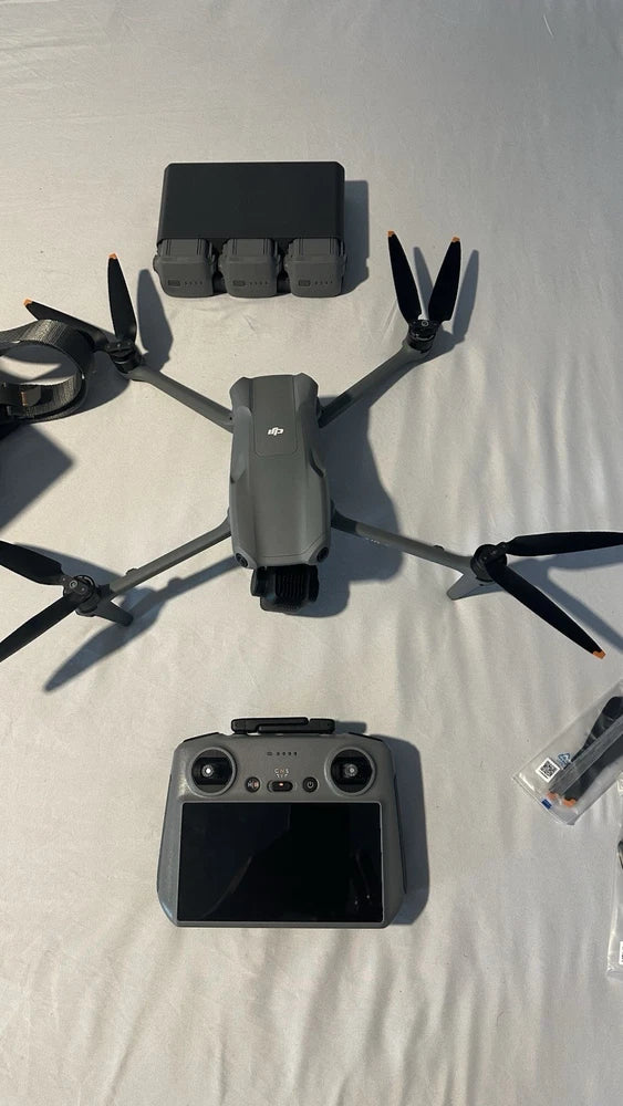 DJI Air 3 drone with RC 2 controller, black quadcopter with folded arms