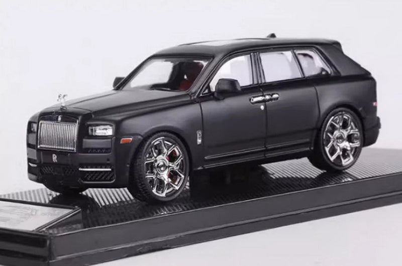 Matte black die-cast Rolls Royce Cullinan 1/64 scale model car with chrome wheels