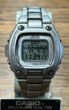 Titanium CASIO G-SHOCK digital wristwatch with metal bracelet and LCD display