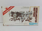 Vintage model rocket kit box with illustrated crew and twin launcher, 1:72 scale