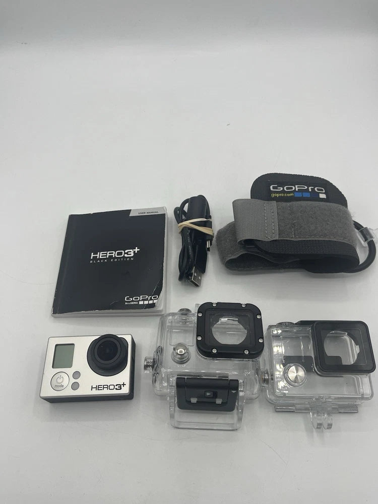 GoPro action camcorder with waterproof housings, mounts, and accessories kit