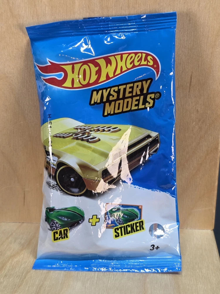 Hot Wheels Mystery Models 2016 car blister pack with sticker sheet, 3+