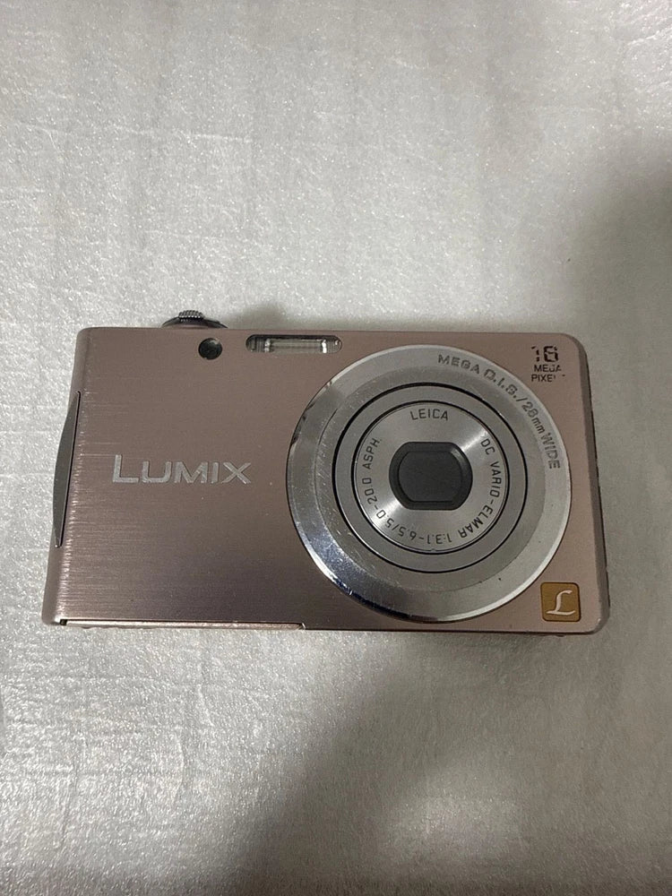Panasonic Lumix compact digital camera body, silver with built-in lens and flash