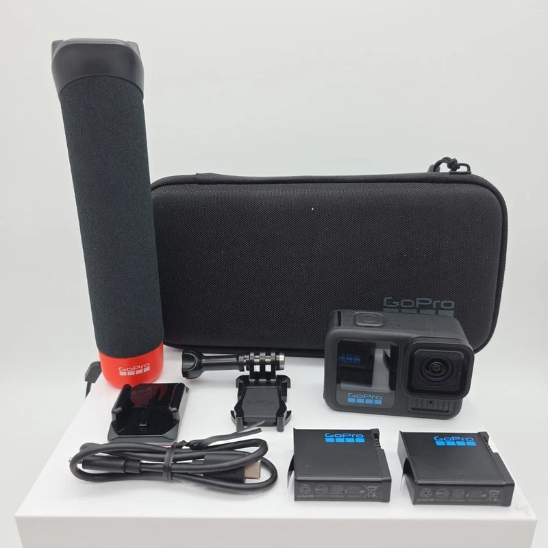 GoPro HERO13 action camera kit with black case, mounts, cable, and two batteries
