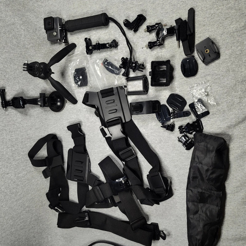 GoPro HERO action camera accessory bundle with chest harness and multiple mounts