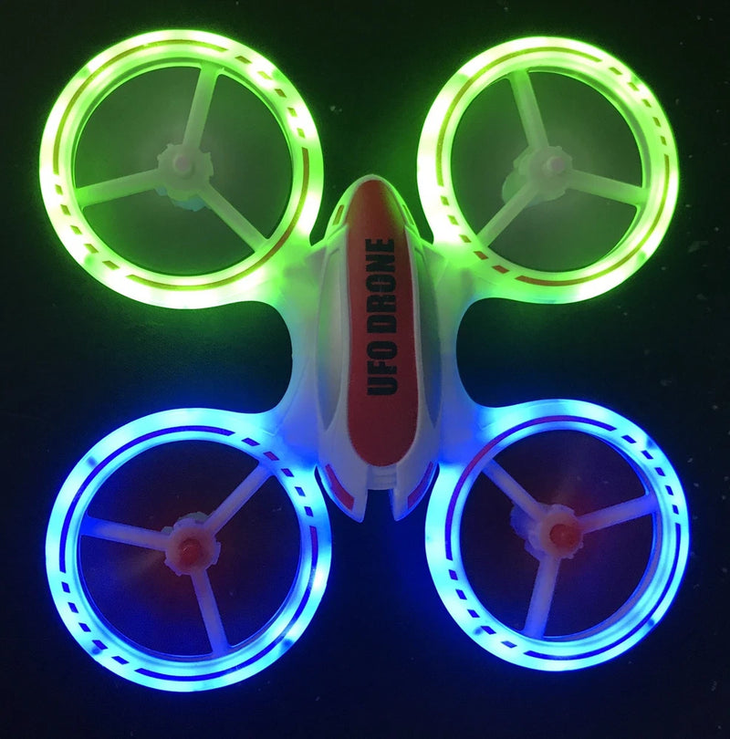 RC quadcopter drone with four LED ring lights and red central body