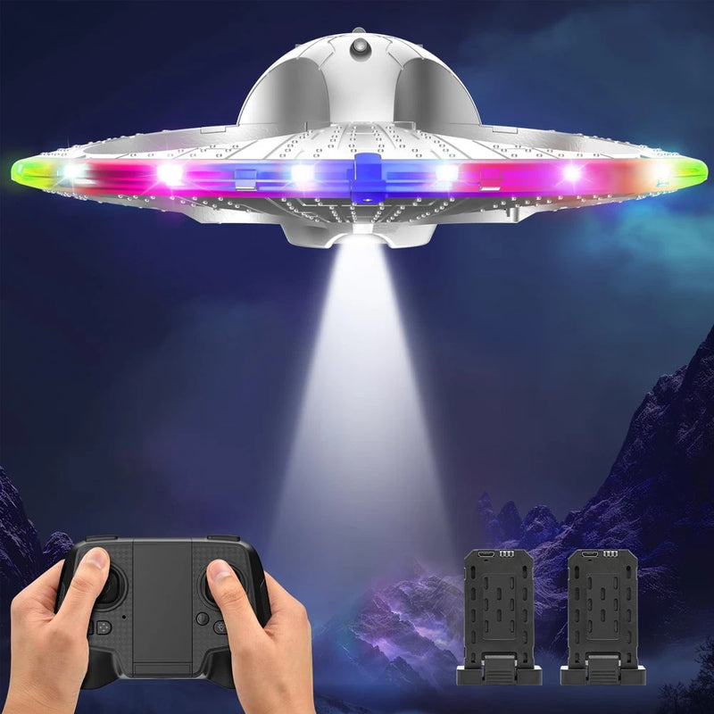 Silver foam UFO drone with glowing multicolor LED lights and control controller