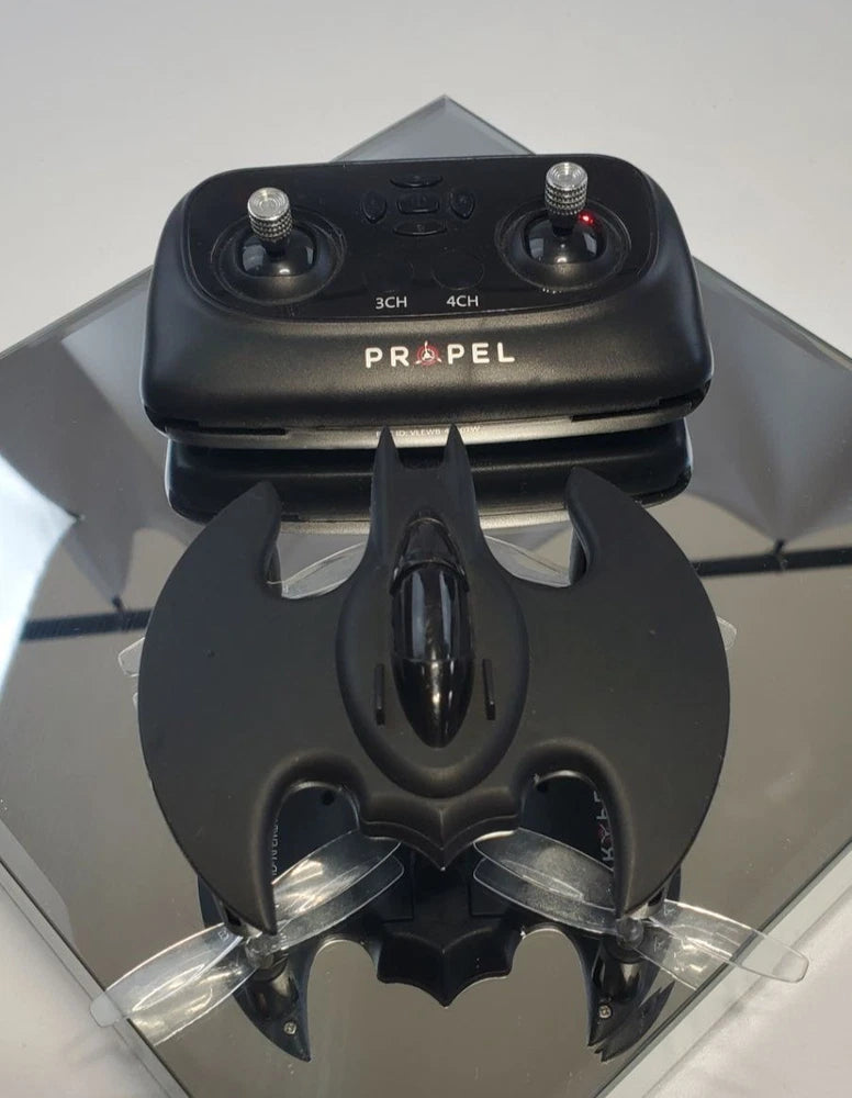 Black Propel stunt quadcopter drone with bat-themed front and two antennas