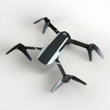 Kids mini quadcopter drone with four foldable propellers, black/gray