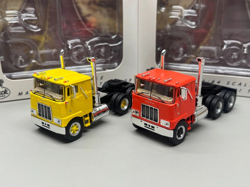 1/64 Mack F700 alloy trailer model, yellow and red cab trucks with chrome details
