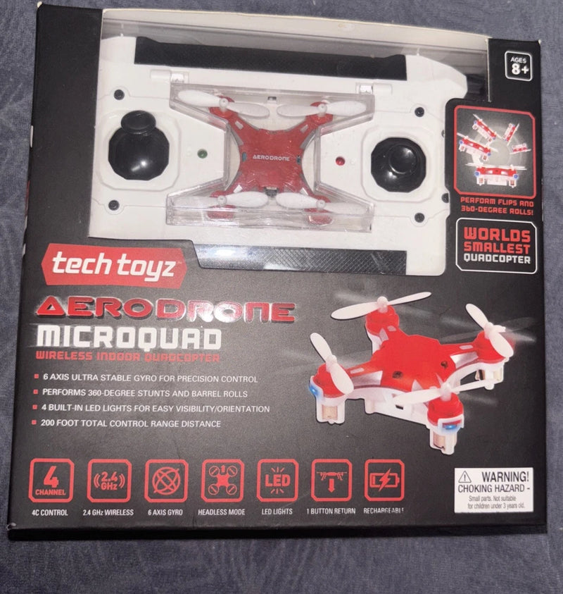 Red and white RC micro quadcopter drone in retail box packaging