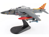 1/72 AV-8B Harrier II Plus aircraft model with gray body, colorful tail, on stand