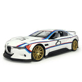 1:24 scale diecast toy race car, white with blue and red stripes, gold wheels