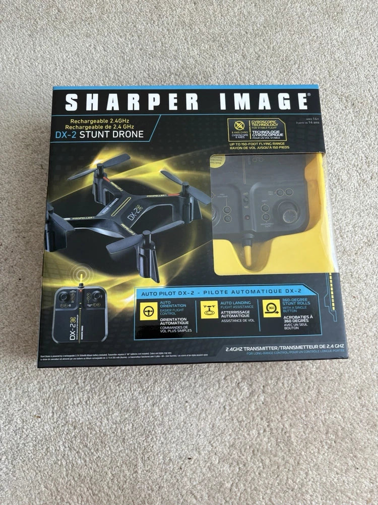 Sharper Image DX-2 stunt drone starter box with quadcopter and remote controller