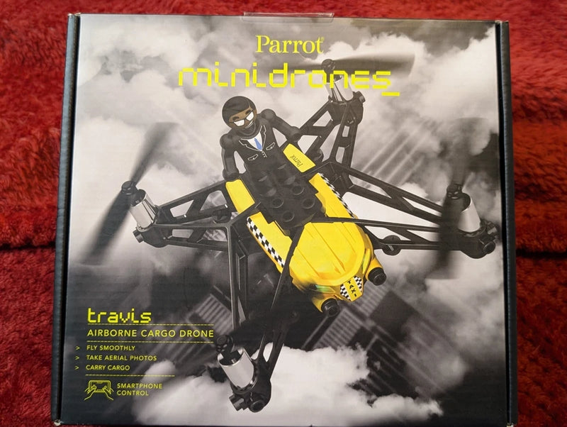 Parrot miniDrone airborne cargo drone box with yellow-and-black quadcopter artwork