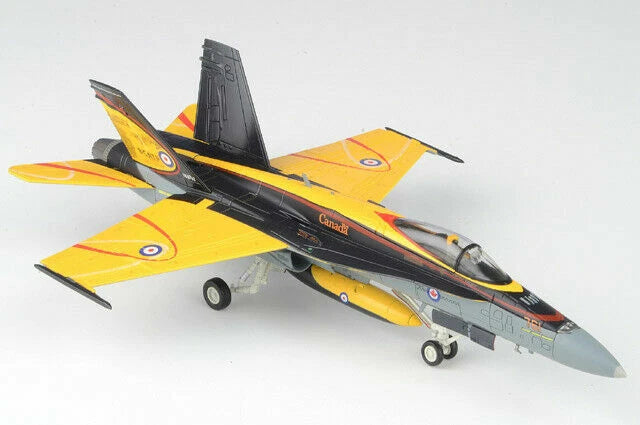 Yellow and black fighter jet model with gray nose and roundel markings