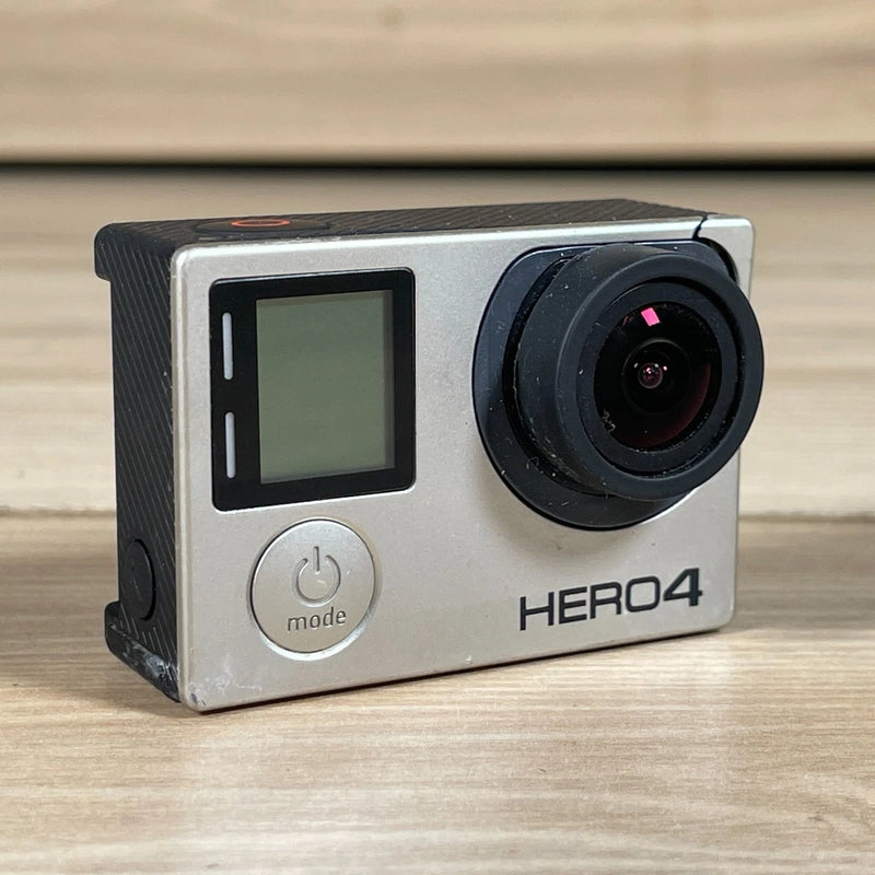 GoPro HERO4 action camera with silver body, front lens, and touch screen display