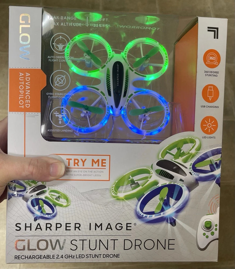 Sharper Image glow stunt LED drone with blue-green lights