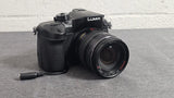 Panasonic Lumix DMC-GH4 16MP 4K Mirrorless with Lumix G X Vario 12-35mm Lens