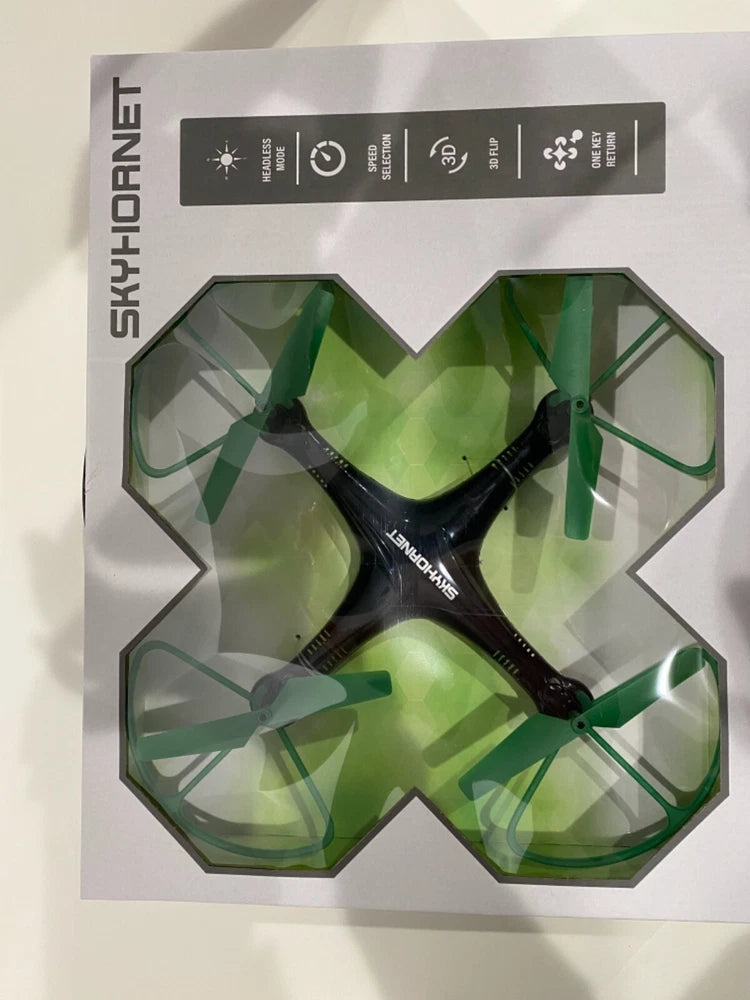 Boxed quadcopter drone with green propellers