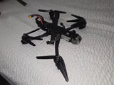 DJI FPV freestyle quadcopter drone, black frame with front camera and four arms