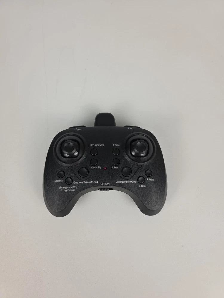 Black game controller with dual joysticks, triggers, and multiple buttons