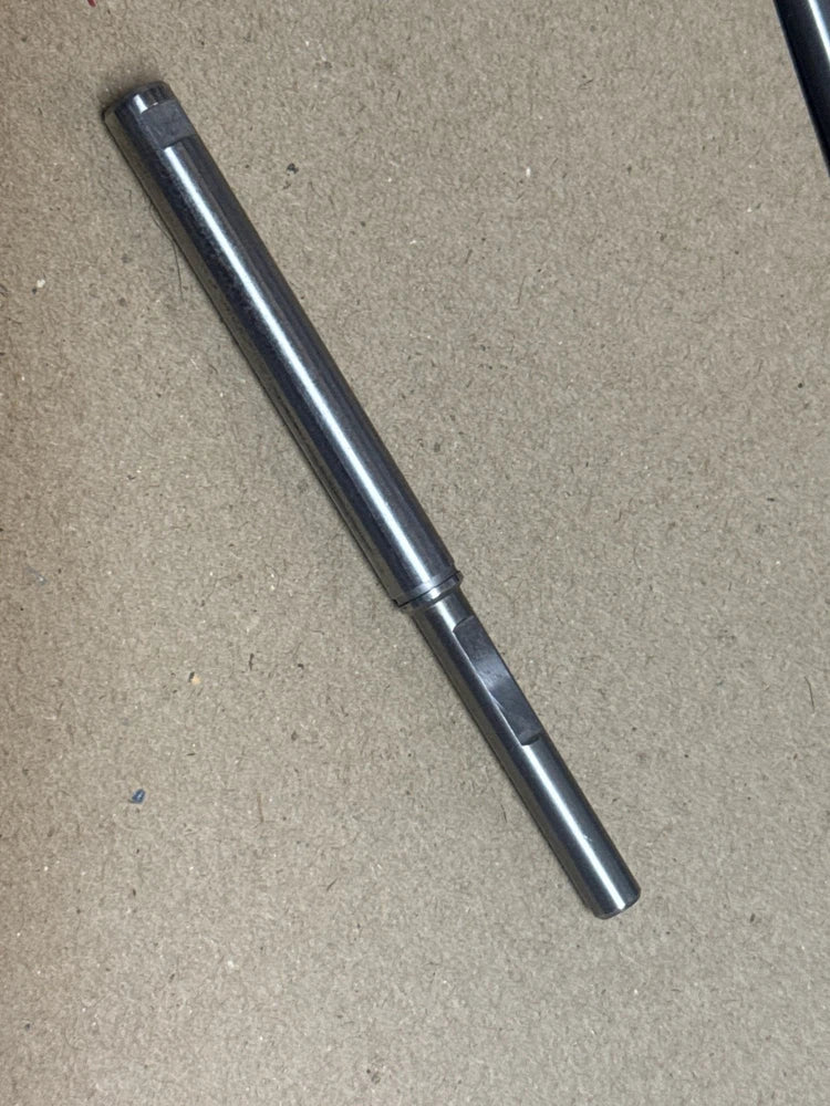 Metal motor replacement shaft, cylindrical steel rod with beveled end