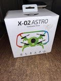 Green quadcopter drone with Wi-Fi camera on retail box