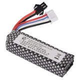 Black carbon-fiber style LiPo battery pack with red and blue balance wires