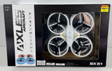 LED RC quadcopter drone with four white propellers in retail box window