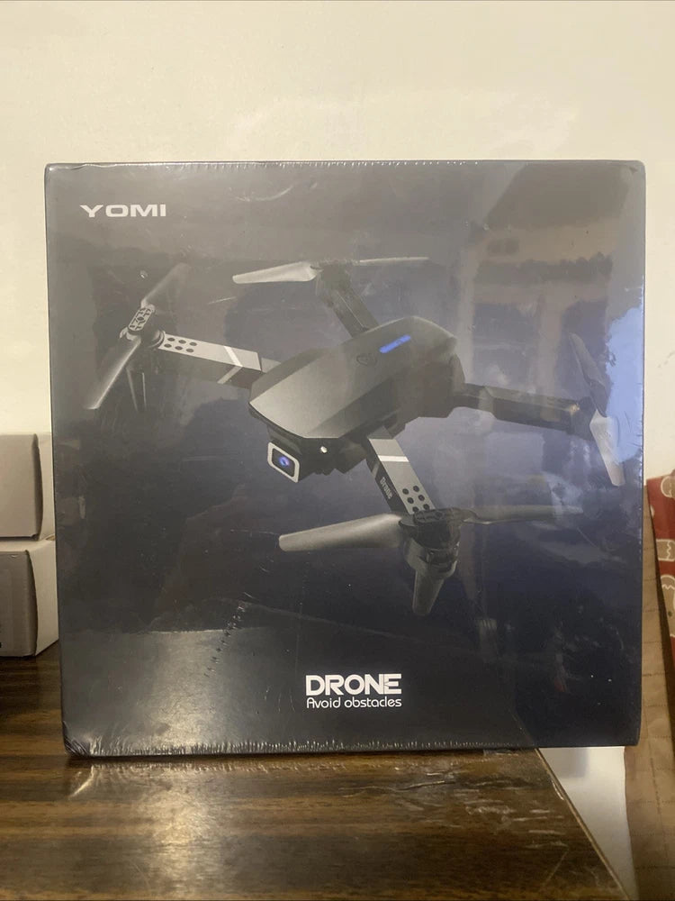 YOMI foldable quadcopter drone box, printed front with Drone logo and blue accents