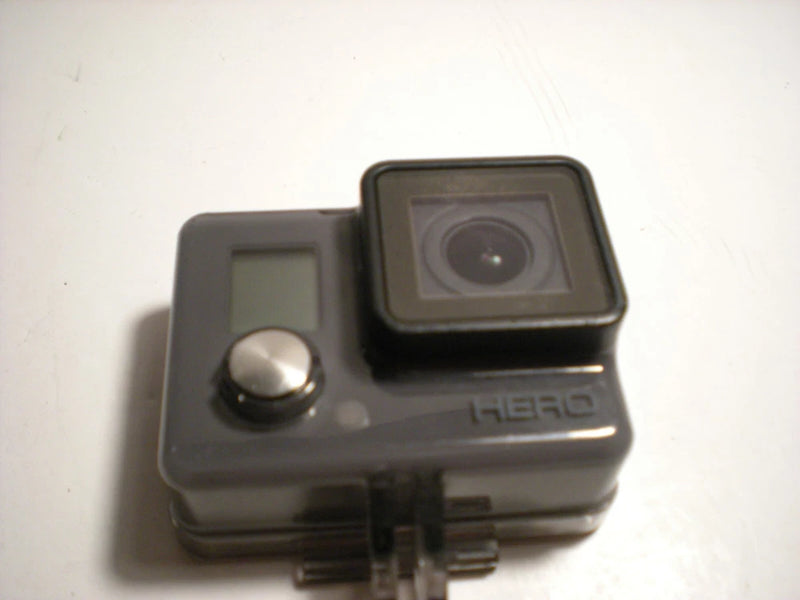 GoPro HERO action camera in gray housing, front lens and HERO logo