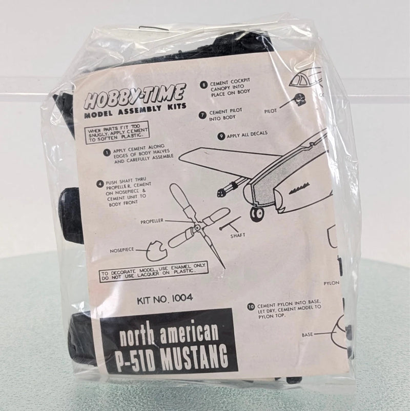 P-51D Mustang model kit in clear bag with assembly diagram and kit label